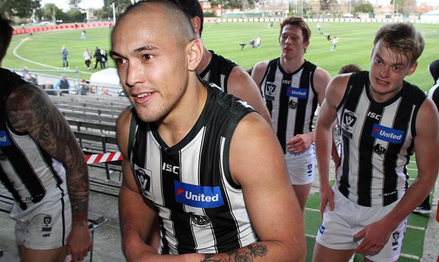 180911_woodward620.png Alex Woodward leads the VFL Magpies off Windy Hill after victory over Essendon in round 16. Photo: Shane Barrie. - Collingwood,Collingwood Magpies,Alex Woodward